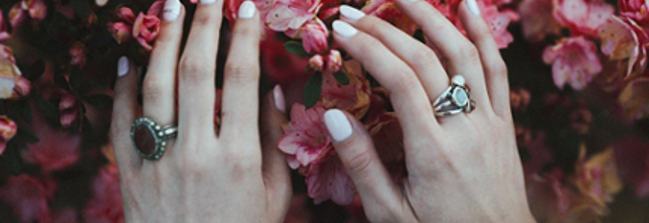 Hand model posing with rings image