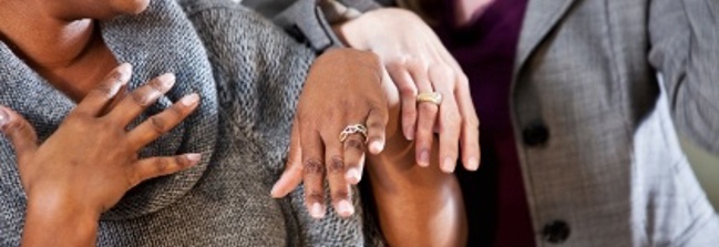 Women show off their rings Image